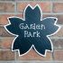 Flower shaped slate house sign