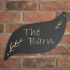 Leaf shaped slate house sign